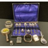 A silver vesta; another, plated; a silver caddy spoon, Sheffield 1895; a silver thimble; a set of