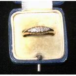 A diamond quintet line ring, 18ct gold shank, 3.2g gross
