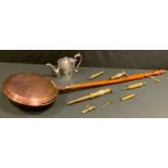 A 19th century copper warming pan, turned handle, c.1890; an EPBM teapot; brass taps and syringes;