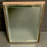 A silver rectangular easel mirror, quite plain, 27.5cm x 20cm, Birmingham 1935