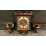 A pair of early 20th century mahogany carved wall shelves, 19cm high; a President mahogany effect