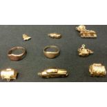 A 9ct rose gold signet ring, another; 9ct gold charms, Ice skate, Chest, sailing ship, etc, 23.8g