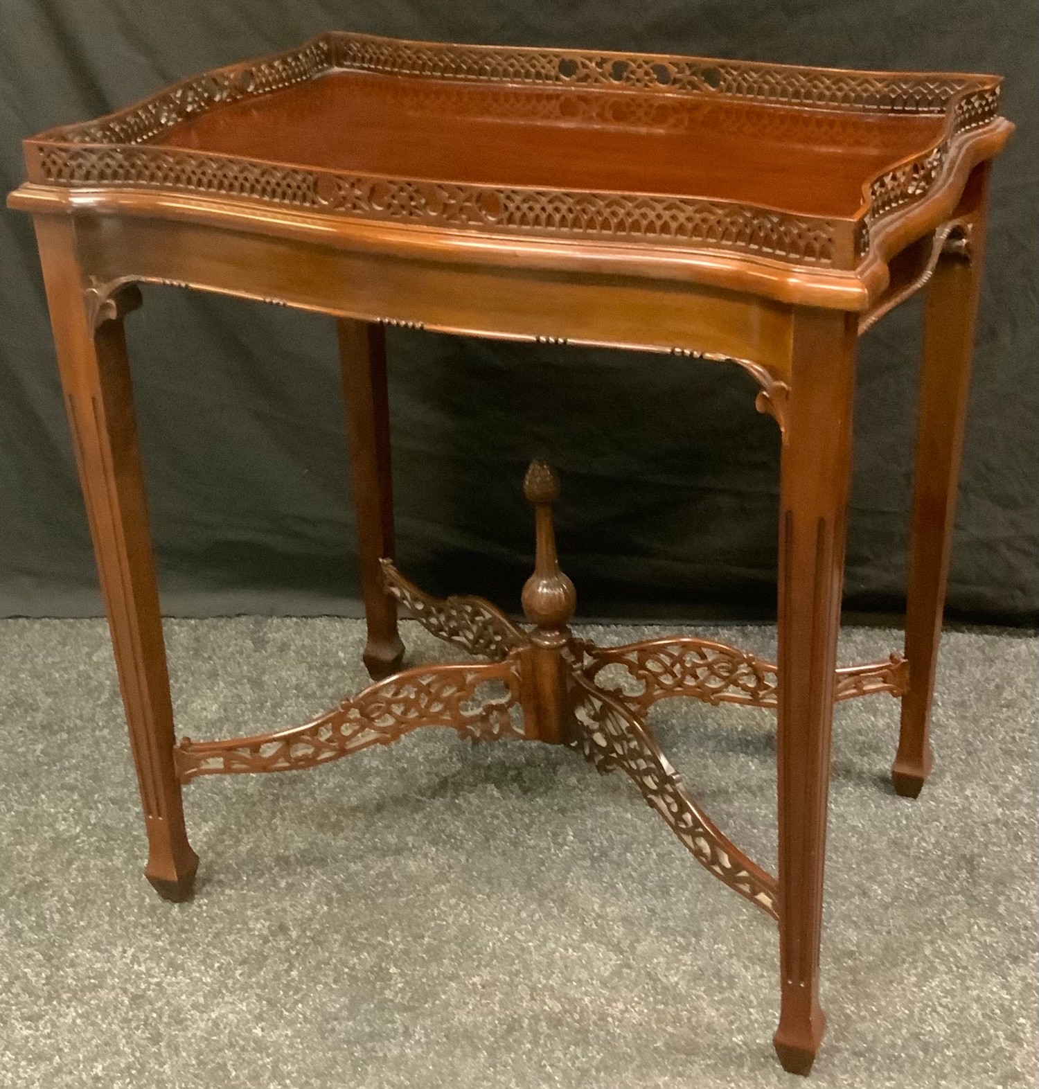 A reproduction regency style silver table, pierced gallery, tapered reeded legs, 74cm high 68cm