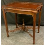 A reproduction regency style silver table, pierced gallery, tapered reeded legs, 74cm high 68cm
