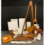 Artist Equipment - a large folding easel stand; others table top, artist oil paint pallets,
