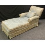 A drop end day bed, stuffed over upholstery, brass casters, 180cm long