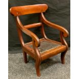 A 19th century mahogany child's commode/chair, bar back, scroll arms, 52cm high.