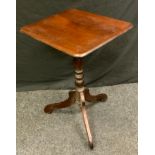 A George III mahogany tripod occasional table, one-piece rounded rectangular tilting top, turned