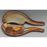 A late 19th century Meerschaum pipe, carved with a horse, amber mouthpiece, 17.5cm long, cased, c.