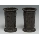 A pair of Regency brown-patinated bronze mantel specimen vases, cast with acanthus leaves, foliate