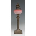A small Victorian brass oil lamp, Duplex-type burner, fluted pink satin Vaseline glass reservoir,