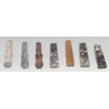 A collection of agate knife or dagger handles, the longest 9cm
