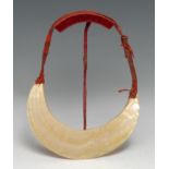 Tribal Art - a Polynesian pearl shell neck ornament, 21.5cm wide, 18cm wide, display stand, Papua