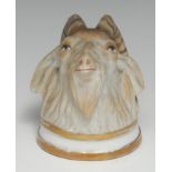 A 19th century Continental porcelain stirrup cup, modelled as the head of a goat, gilt borders, 10cm