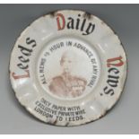 Advertising - an enamel ashtray, printed in the manner of a sign, Leeds Daily News, All News 1/2
