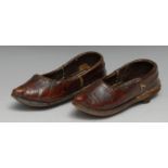 Costume - a pair of 18th or 19th century children's red leather shoes, pointed toes, sewn seems,