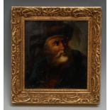 A 19th century Russian cabinet picture, painted with a bearded elder dressed for winter,
