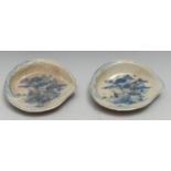 A pair of Japanese porcelain brush washers, each as an abalone shell, painted in tones of underglaze