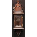 A 19th century Gothic Revival oak wall mounted country house post box, shaped cresting, moulded