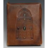 A Secessionist style leather desk companion, embossed in the Celtic taste and applied with