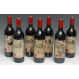 Seven bottles of Château Haut-Goujon 1983 Lalande-de-Pomerol, 75cl, labels poor-OK, levels at