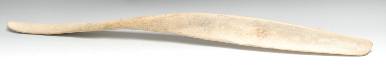 Tribal Art - an Inuit whale bone club, 87cm long