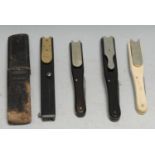 A 19th century ebony quill cutter, by Rodgers, Sheffield, tooled slip case; others, similar (4)