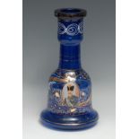 An Ottoman blue glass bell shaped hookah base, decorated in polychrome with a portrait of Sultan