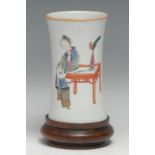 A Chinese flared cylindrical brush pot, painted in polychrome enamels with a scholar's table, 12.5cm