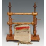 A 19th century turned table-top embroidery frame, rectangular base, bun feet, 22cm wide