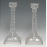 A pair of 19th century Adam Revival Neo Classical pressed glass table candlesticks, of silver shape,