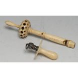 A 19th century bone baby's rattle, pierced chamber, whistle terminal, 13cm long; a George V silver