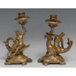 A pair of Renaissance Revival gilt bronze candlesticks, cast in the Mannerist taste with satyr and