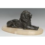 A French spelter library desk model, of a recumbent lion, oval white onyx base, 31cm wide overall,