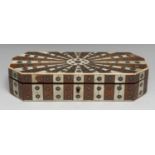 An early 19th century Anglo-Indian hardwood and ivory parquetry canted rectangular box, veneered