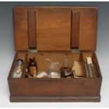 Medical Interest - a 19th century oak field medicine and dentistry chest, hinged cover enclosing