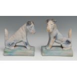 A pair of Bourne Denby Danesby Ware novelty terrier bookends, designed by Alice Teichtner, glazed in