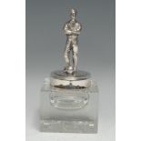 Football - an E.P.N.S mounted clear glass square desk inkwell, the hinged cover as an Edwardian
