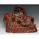 Luggage - a brown leather mounted kilim Gladstone bag, 47cm wide