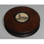 Treen - a 19th century salvaged oak waisted circular snuff box, the push-fitting cover centred by