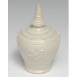 A 19th century buff-coloured stoneware money box, sprigged with flowers and inscribed Emma Mason,