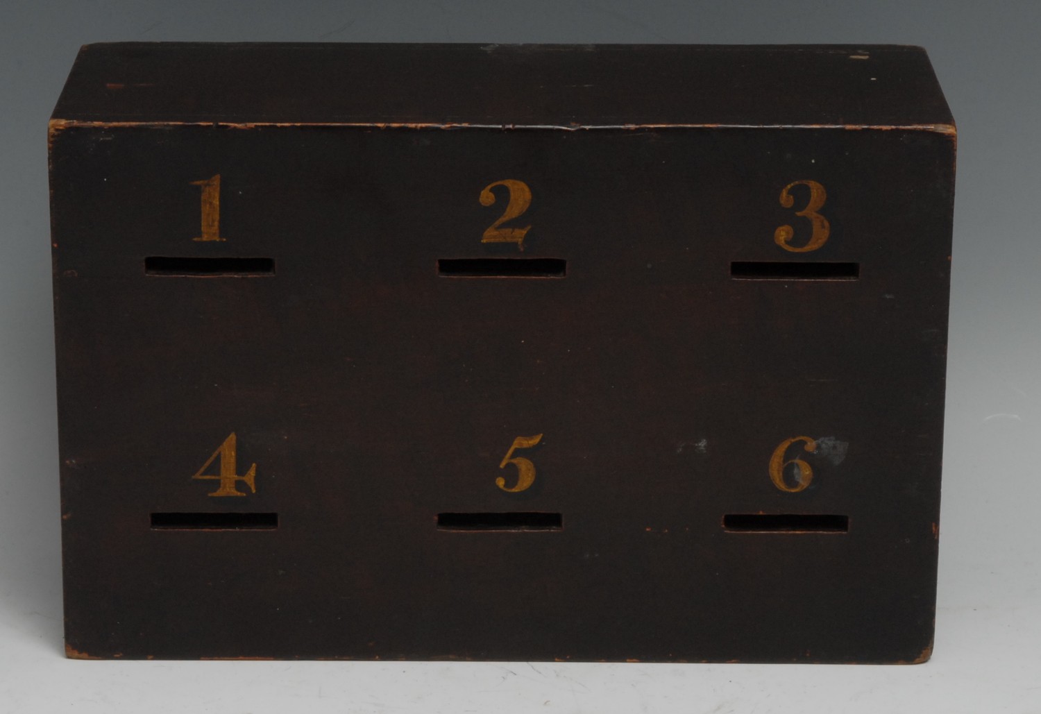 A 19th century rectangular ballot box, the six apertures numbered in gilt, sliding cover to verso,