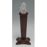 A frosted glass miniature bust, mounted for the desk on a mahogany pedestal, 15cm high