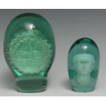 A Victorian green glass dump, sulphur inclusion inscribed Compliments of the Season, 15cm high, c.
