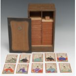 A set of Japanese Uta-garuta playing cards, composed of the Hyakunin Isshu of the Hundred Poets,