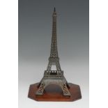 An architectural library desk model, of the Eiffel Tower, canted square hardwood base, 32cm high