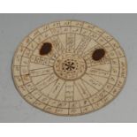 A William IV ink manuscript perpetual calendar, inscribed on card, revolving centre, marked out from