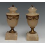 A pair of French Neo-Classical design gilt metal mounted alabaster mantel urns, acorn finials,