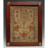 A George IV needlework sampler, Mary Wood, November 8, 1826, worked in coloured wools with verse,