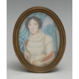 South European School (early 19th century), portrait miniature, of a lady, half-length, oval,